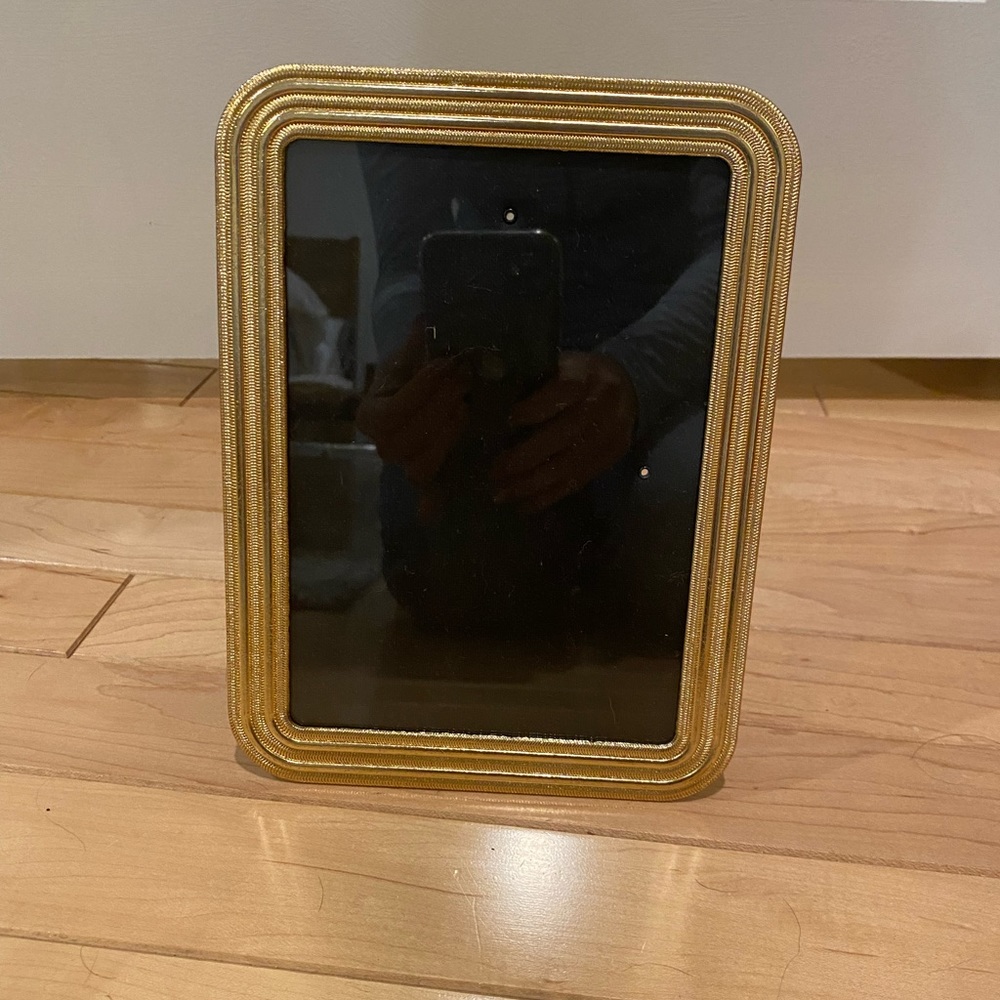 Nicole Miller gold frame